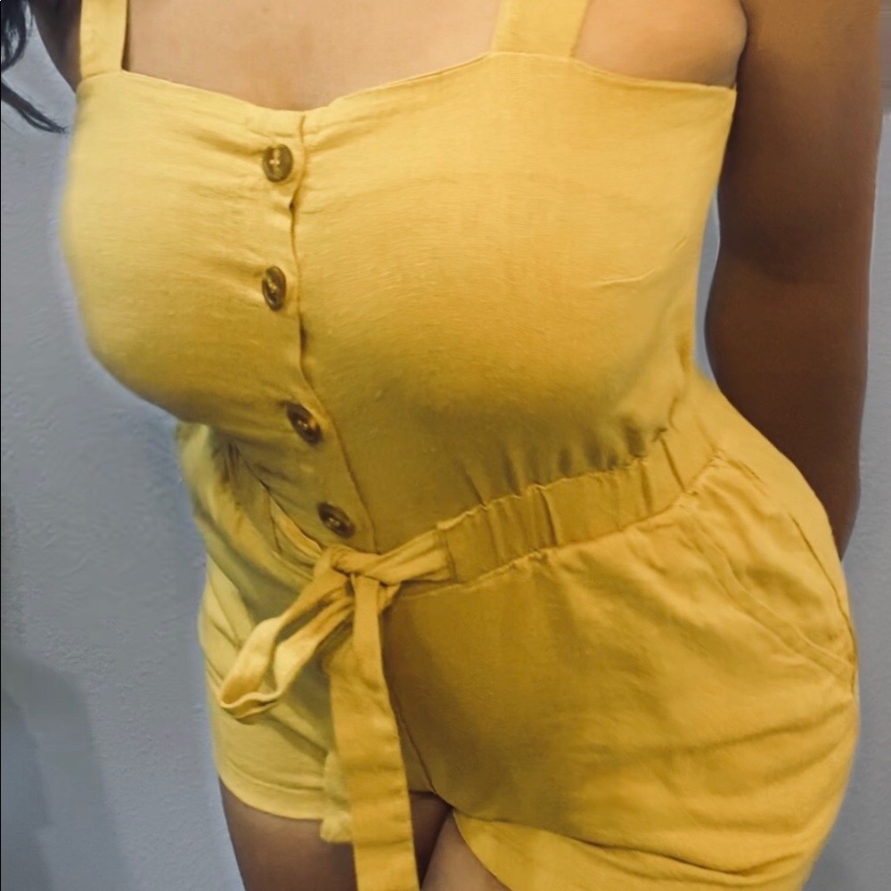 Yellow romper.